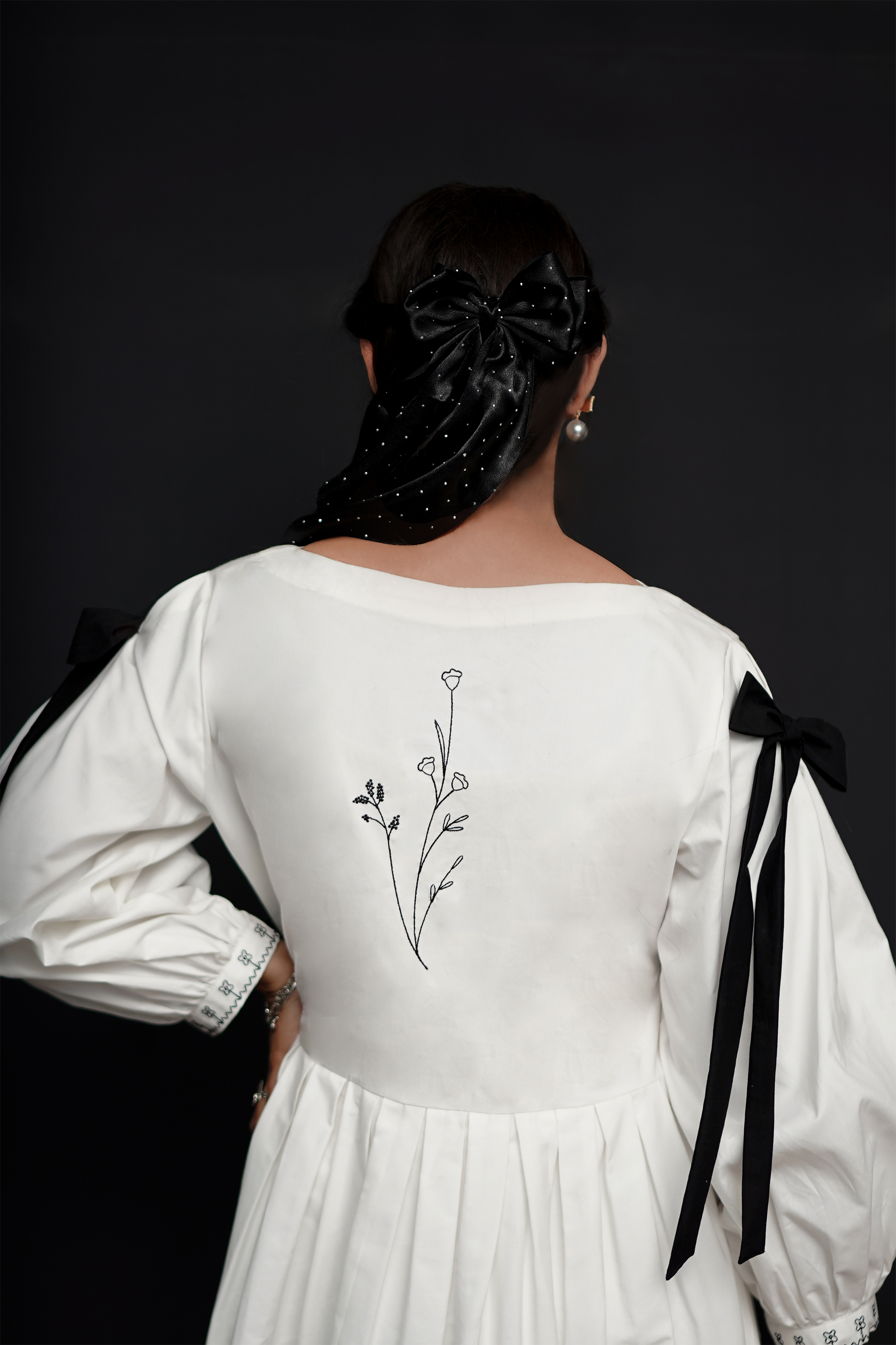 White frock with black embroidery – classic formal dress for women