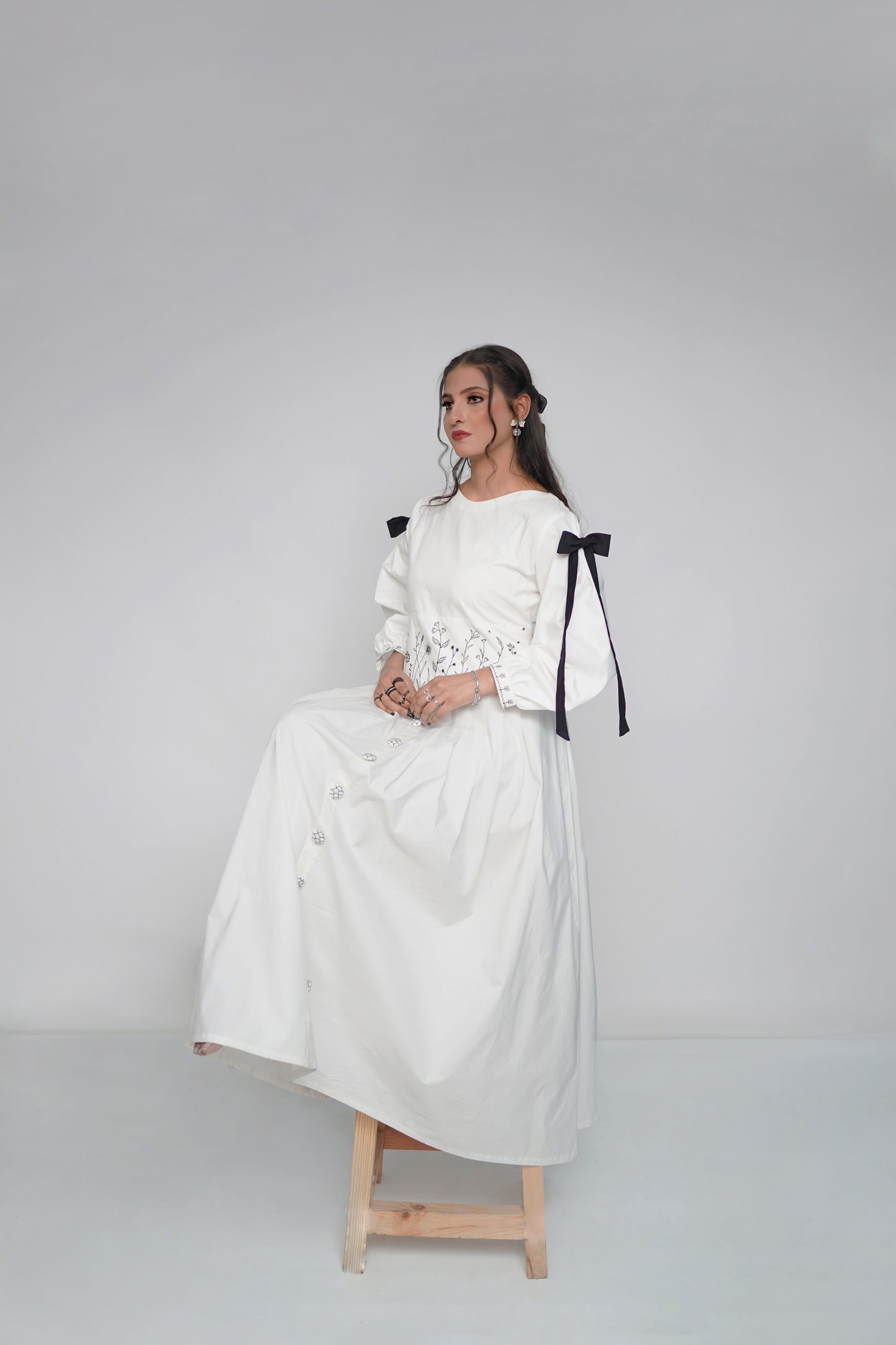 White frock with black embroidery – classic formal dress for women